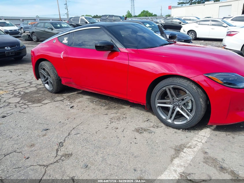 2025 Nissan Z VIN JN1BZ4AH8SM412322 IAAI salvage auction — SIDE, Salvage Title, sold $16,400 on 2026-07-08 (photo 6)
