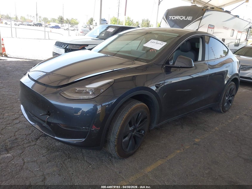 2024 Tesla Model y VIN 7SAYGDED6RF132764 IAAI salvage auction — SIDE, Salvage (California), sold $12,350 on 2026-07-16 (photo 2)