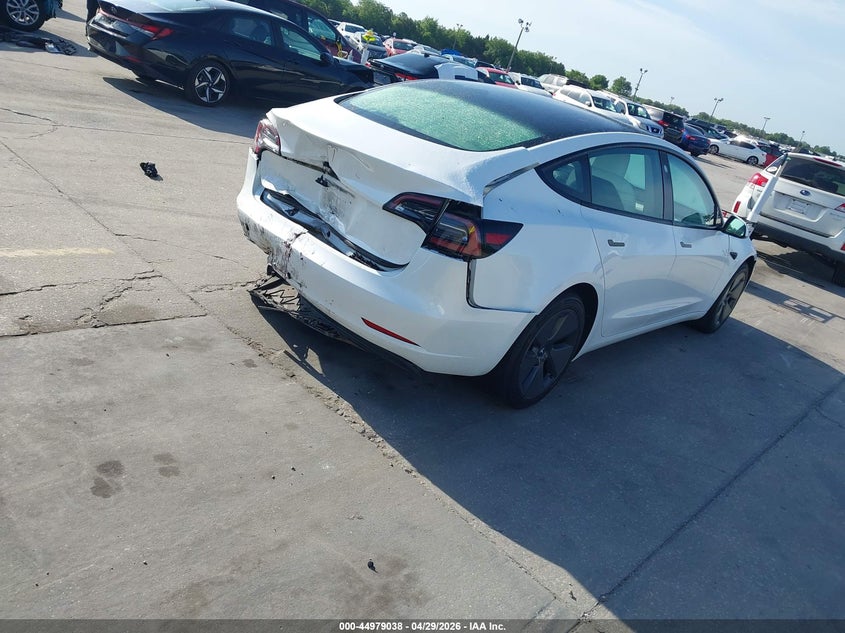 2023 Tesla Model 3 VIN 5YJ3E1EA3PF517133 IAAI salvage auction — FRONT & REAR, Salvage Title, sold $6,100 on 2026-07-09 (photo 4)