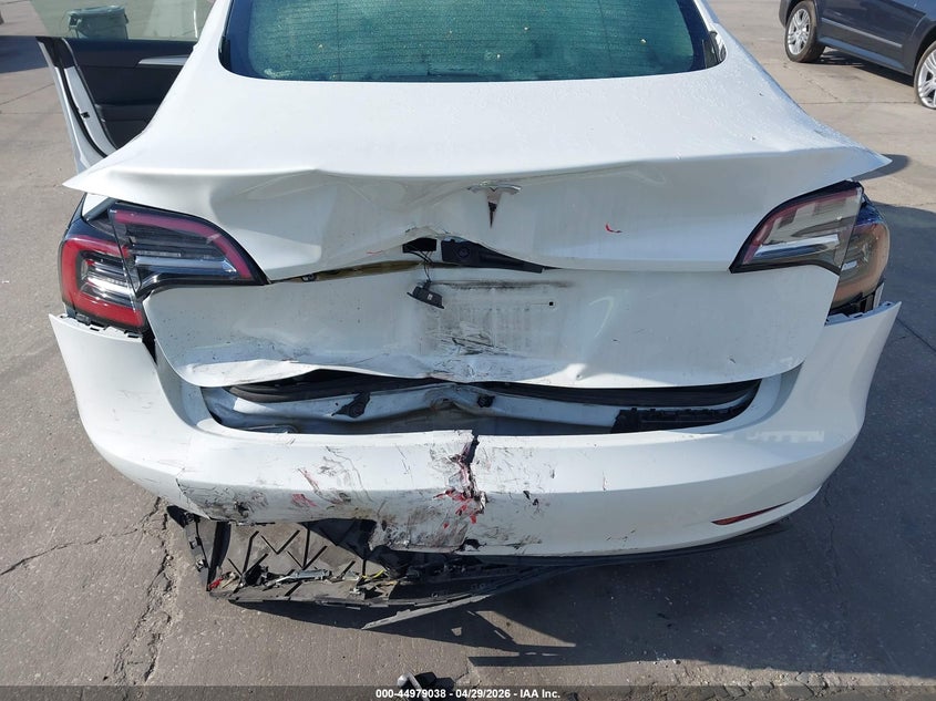 2023 Tesla Model 3 VIN 5YJ3E1EA3PF517133 IAAI salvage auction — FRONT & REAR, Salvage Title, sold $6,100 on 2026-07-09 (photo 6)