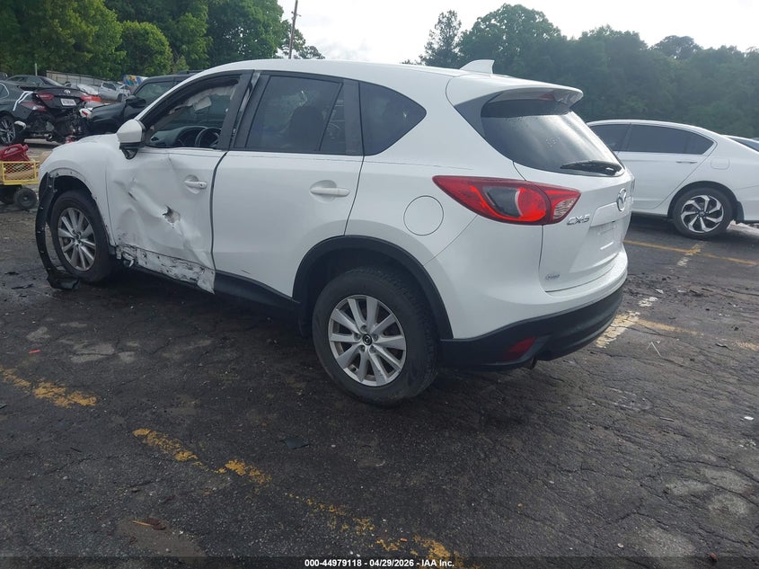 2014 Mazda Cx-5 VIN JM3KE2CY3E0380070 IAAI salvage auction — SIDE, Salvage Title, sold $2,250 on 2026-07-11 (photo 3)
