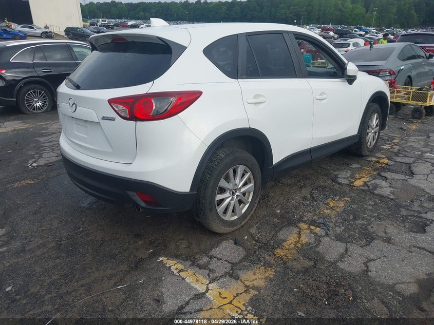 2014 Mazda Cx-5 VIN JM3KE2CY3E0380070 IAAI salvage auction — SIDE, Salvage Title, sold $2,250 on 2026-07-11 (photo 4)