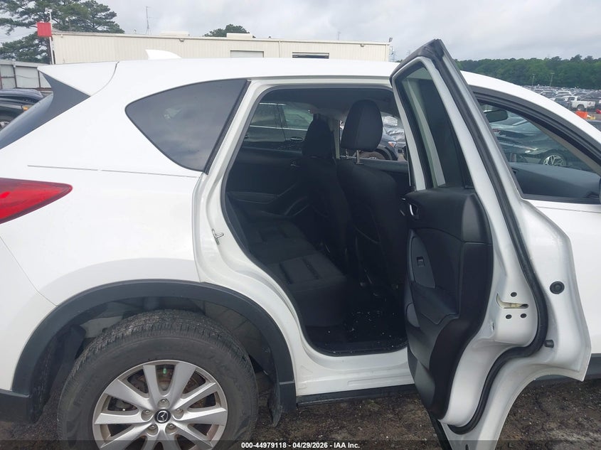 2014 Mazda Cx-5 VIN JM3KE2CY3E0380070 IAAI salvage auction — SIDE, Salvage Title, sold $2,250 on 2026-07-11 (photo 8)