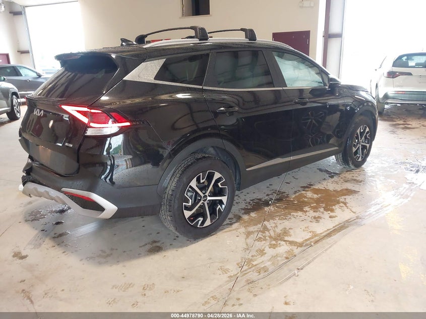 2023 Kia Sportage VIN KNDPVCAG3P7030883 IAAI salvage auction — REAR END, Salvage Title, sold $8,300 on 2026-07-17 (photo 4)