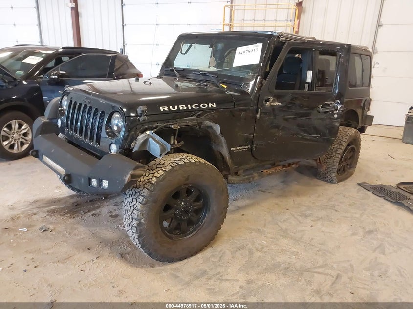 2016 Jeep Wrangler / VIN 1C4BJWFG2GL271244 IAAI salvage auction — SIDE, Clear (Michigan), sold $5,500 on 2026-07-26 (photo 2)