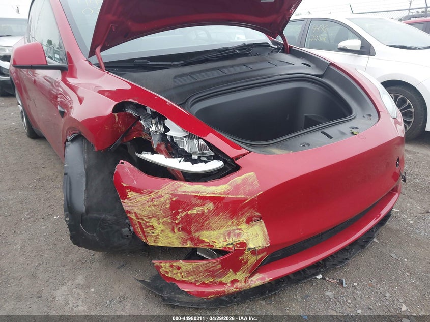 2022 Tesla Model y VIN 7SAYGDEEXNA018797 IAAI salvage auction — RIGHT FRONT, Salvage Title, sold $10,700 on 2026-07-16 (photo 6)