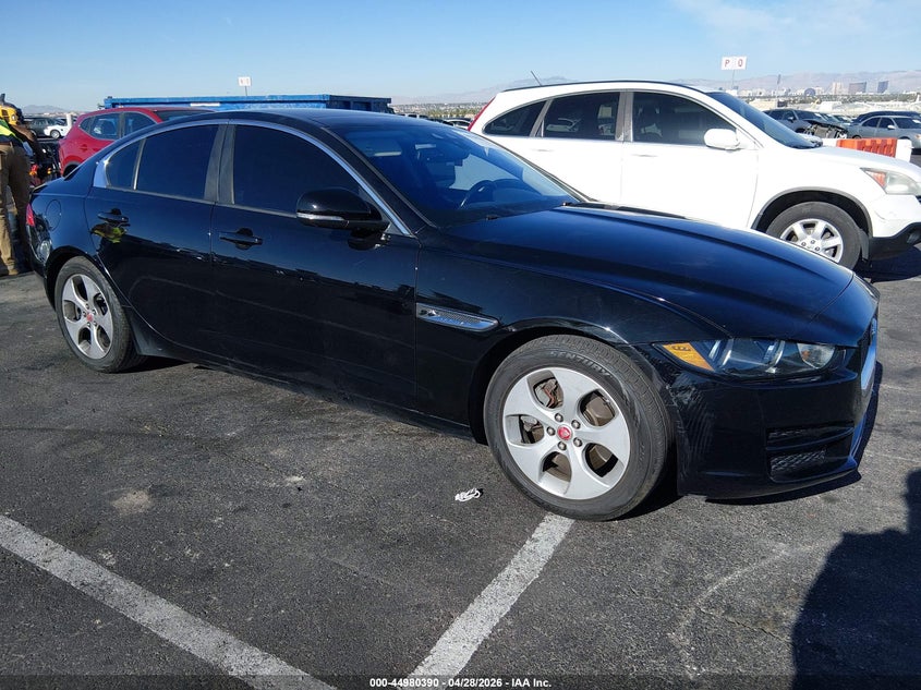 2018 Jaguar Xe VIN SAJAR4FX0JCP27355 IAAI salvage auction — LEFT SIDE, Salvage (Nevada), sold $3,400 on 2026-07-10 (photo 1)