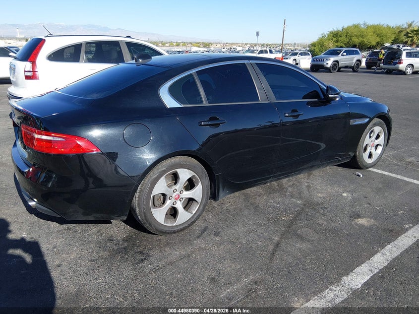 2018 Jaguar Xe VIN SAJAR4FX0JCP27355 IAAI salvage auction — LEFT SIDE, Salvage (Nevada), sold $3,400 on 2026-07-10 (photo 4)