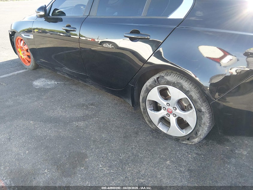 2018 Jaguar Xe VIN SAJAR4FX0JCP27355 IAAI salvage auction — LEFT SIDE, Salvage (Nevada), sold $3,400 on 2026-07-10 (photo 6)