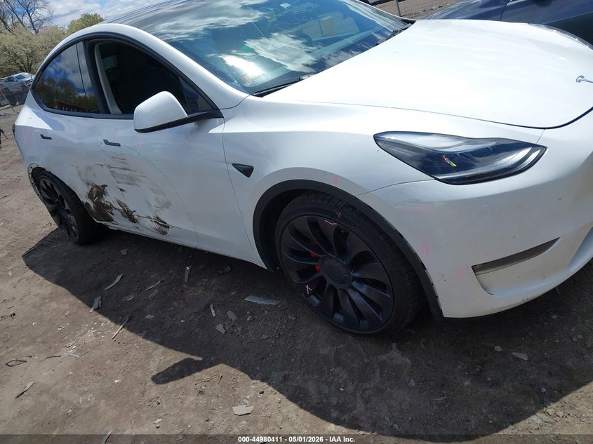 2023 Tesla Model y VIN 7SAYGDEF1PF797800 IAAI salvage auction — RIGHT SIDE, Salvage (Massachusetts), sold $12,100 on 2026-07-09 (photo 1)