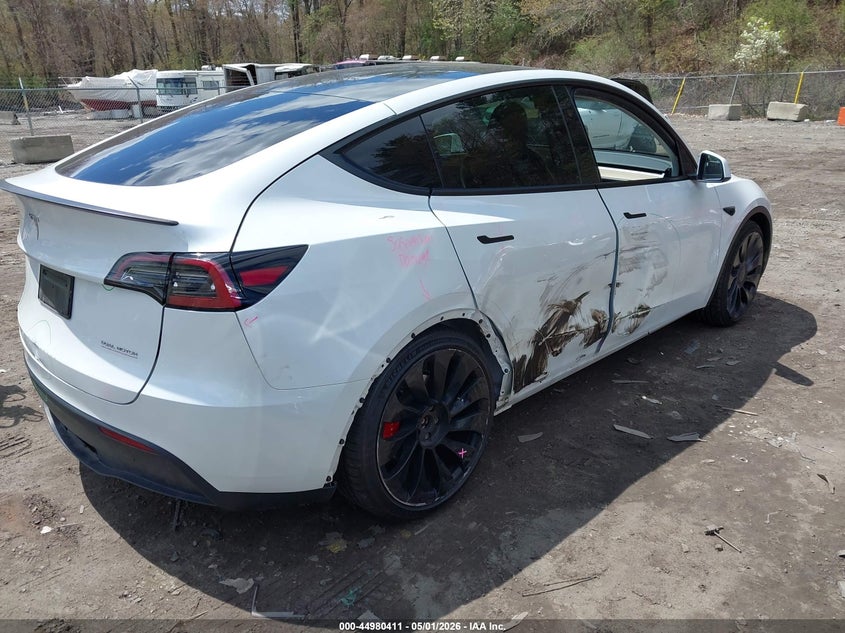 2023 Tesla Model y VIN 7SAYGDEF1PF797800 IAAI salvage auction — RIGHT SIDE, Salvage (Massachusetts), sold $12,100 on 2026-07-09 (photo 4)