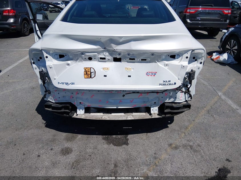 2023 Toyota Mirai VIN JTDAAAAAXPA010599 IAAI salvage auction — FRONT & REAR, Salvage Title, sold $1,700 on 2026-07-30 (photo 6)