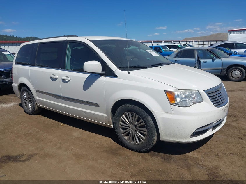 2013 Chrysler Town & country VIN 2C4RC1CG9DR707767 IAAI salvage auction — NORMAL WEAR, Clear (Idaho), sold $275 on 2026-07-12 (photo 1)