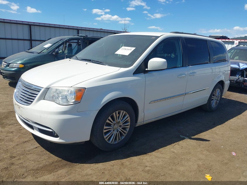 2013 Chrysler Town & country VIN 2C4RC1CG9DR707767 IAAI salvage auction — NORMAL WEAR, Clear (Idaho), sold $275 on 2026-07-12 (photo 2)