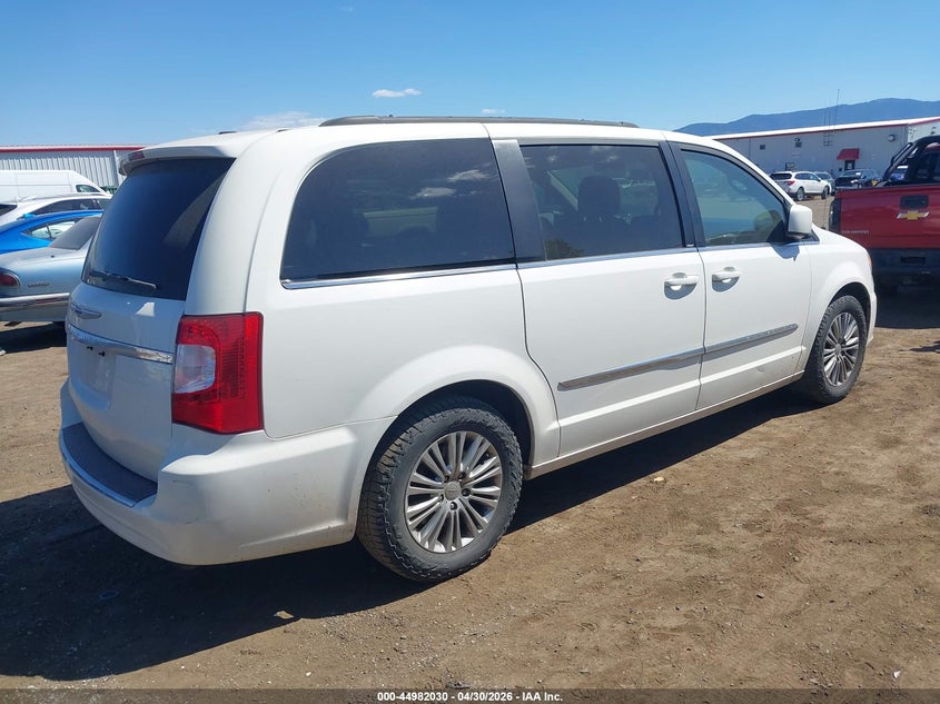 2013 Chrysler Town & country VIN 2C4RC1CG9DR707767 IAAI salvage auction — NORMAL WEAR, Clear (Idaho), sold $275 on 2026-07-12 (photo 4)
