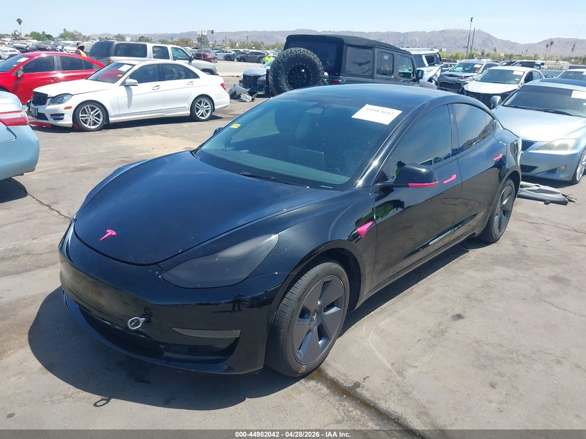 2023 Tesla Model 3 VIN 5YJ3E1EA6PF669780 IAAI salvage auction — RIGHT FRONT, Salvage (Arizona), sold $8,100 on 2026-07-11 (photo 2)