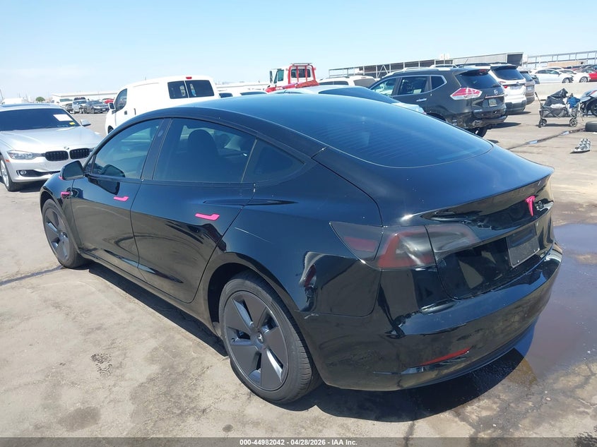 2023 Tesla Model 3 VIN 5YJ3E1EA6PF669780 IAAI salvage auction — RIGHT FRONT, Salvage (Arizona), sold $8,100 on 2026-07-11 (photo 3)