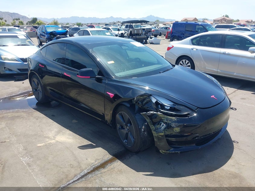 2023 Tesla Model 3 VIN 5YJ3E1EA6PF669780 IAAI salvage auction — RIGHT FRONT, Salvage (Arizona), sold $8,100 on 2026-07-11 (photo 6)