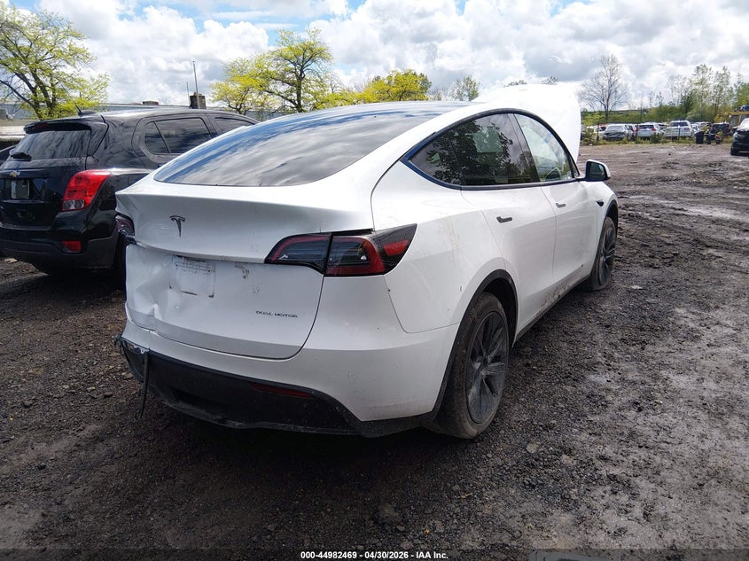 2024 Tesla Model y VIN 7SAYGDEEXRF200198 IAAI salvage auction — LEFT SIDE, Salvage (Ohio), sold $8,800 on 2026-07-30 (photo 4)