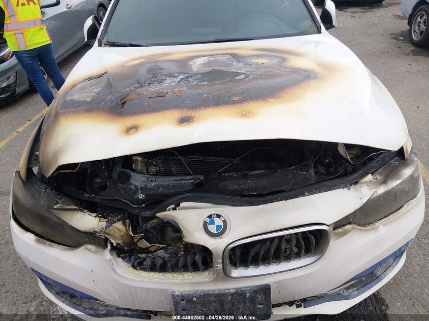 2016 BMW 3er VIN WBA8E3G52GNT79391 IAAI salvage auction — ENGINE BURN, Salvage (Colorado), sold $350 on 2026-09-15 (photo 6)