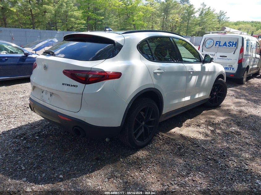 2019 Alfa romeo Stelvio VIN ZASPAKBN3K7C65738 IAAI salvage auction — LEFT SIDE, Salvage (New Jersey), sold $8,075 on 2026-07-15 (photo 4)