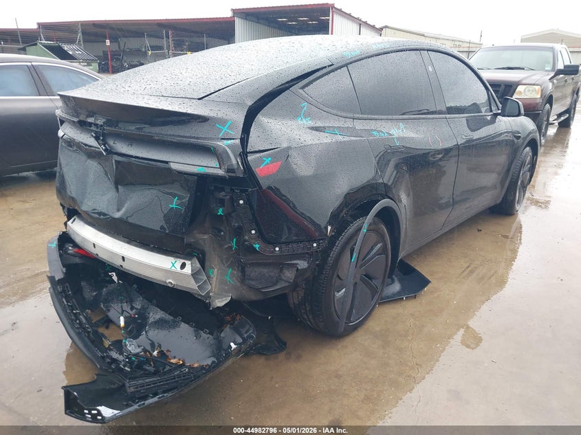 2026 Tesla Model y VIN 7SAYGDED1TA494733 IAAI salvage auction — REAR END, Original (Texas), sold $17,800 on 2026-08-23 (photo 4)