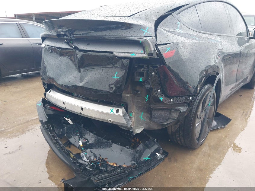 2026 Tesla Model y VIN 7SAYGDED1TA494733 IAAI salvage auction — REAR END, Original (Texas), sold $17,800 on 2026-08-23 (photo 6)