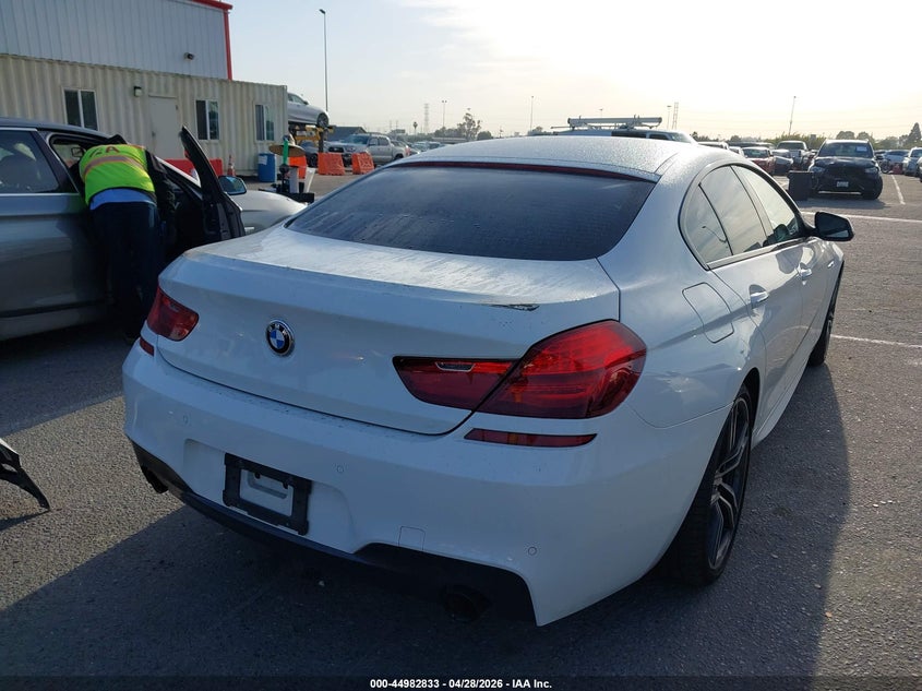 2019 BMW 6er VIN WBA6D0C53KG853084 IAAI salvage auction — LEFT SIDE, Salvage Title, sold $6,900 on 2026-07-30 (photo 4)