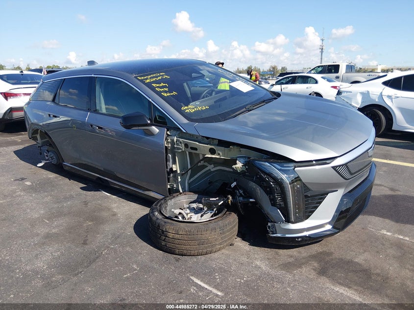 2026 Cadillac Optiq VIN 3GYK3DM55TS110210 IAAI salvage auction — SIDE, Rebuildable (Florida), sold $12,450 on 2026-07-16 (photo 1)