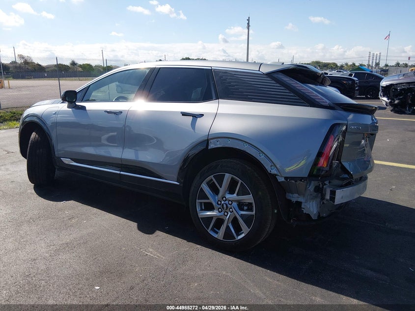 2026 Cadillac Optiq VIN 3GYK3DM55TS110210 IAAI salvage auction — SIDE, Rebuildable (Florida), sold $12,450 on 2026-07-16 (photo 3)