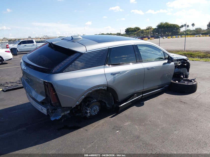 2026 Cadillac Optiq VIN 3GYK3DM55TS110210 IAAI salvage auction — SIDE, Rebuildable (Florida), sold $12,450 on 2026-07-16 (photo 4)