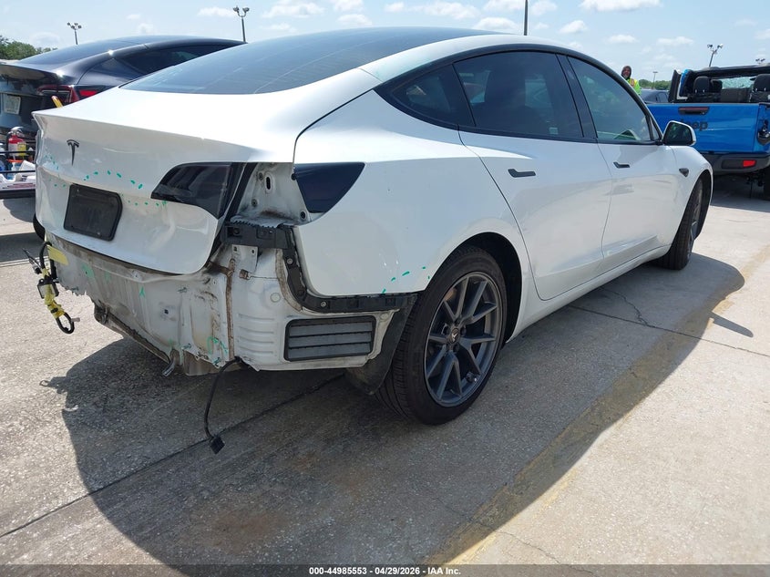 2021 Tesla Model 3 VIN 5YJ3E1EA8MF919421 IAAI salvage auction — REAR END, Rebuildable (Florida), sold $7,750 on 2026-09-08 (photo 4)