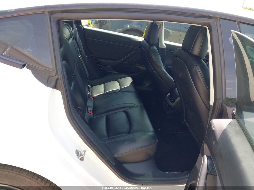 2021 Tesla Model 3 VIN 5YJ3E1EA8MF919421 IAAI salvage auction — REAR END, Rebuildable (Florida), sold $7,750 on 2026-09-08 (photo 8)