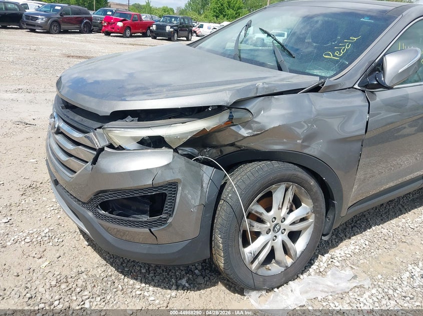 2013 Hyundai Santa fe VIN 5XYZWDLA6DG057885 IAAI salvage auction — NORMAL WEAR, Salvage Title, sold $700 on 2026-07-15 (photo 6)