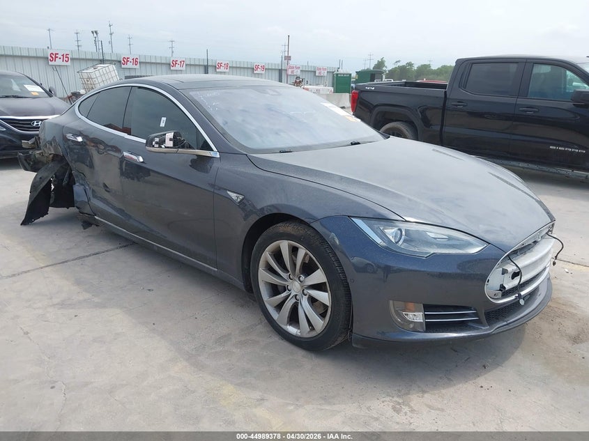 2015 Tesla Model s VIN 5YJSA1E2XFF101949 IAAI salvage auction — LEFT SIDE, Original (Texas), sold $2,750 on 2026-07-27 (photo 1)