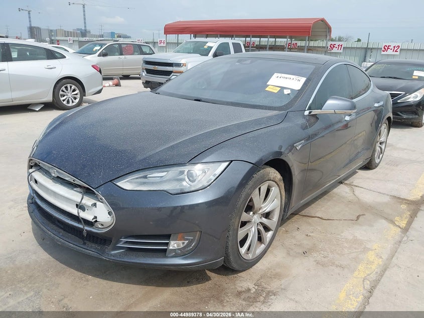 2015 Tesla Model s VIN 5YJSA1E2XFF101949 IAAI salvage auction — LEFT SIDE, Original (Texas), sold $2,750 on 2026-07-27 (photo 2)