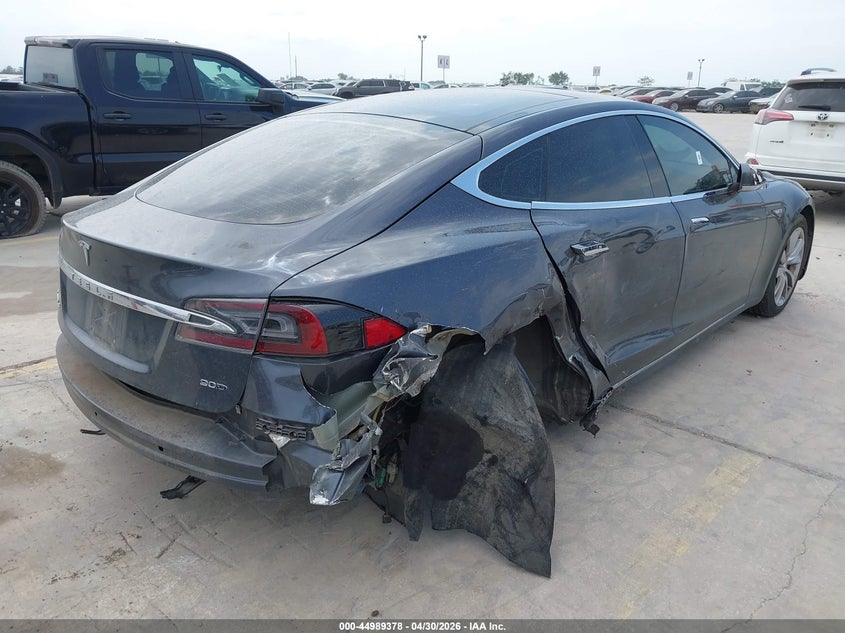 2015 Tesla Model s VIN 5YJSA1E2XFF101949 IAAI salvage auction — LEFT SIDE, Original (Texas), sold $2,750 on 2026-07-27 (photo 4)