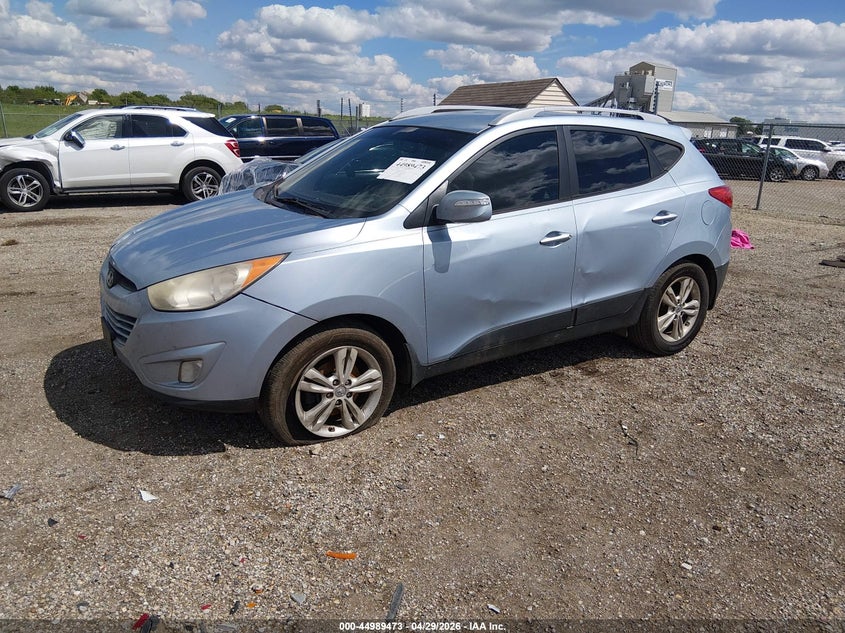 2013 Hyundai Tucson VIN KM8JU3AC3DU693546 IAAI salvage auction — SIDE, Salvage (Illinois), sold $1,100 on 2026-07-09 (photo 2)