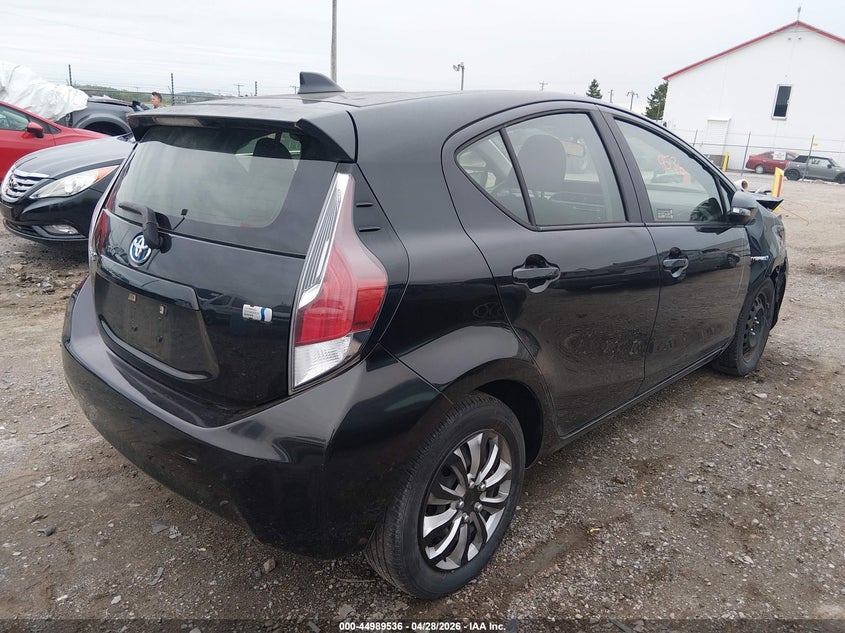 2016 Toyota Prius c VIN JTDKDTB39G1120325 IAAI salvage auction — NORMAL WEAR, Salvage Title, sold $1,425 on 2026-07-20 (photo 4)