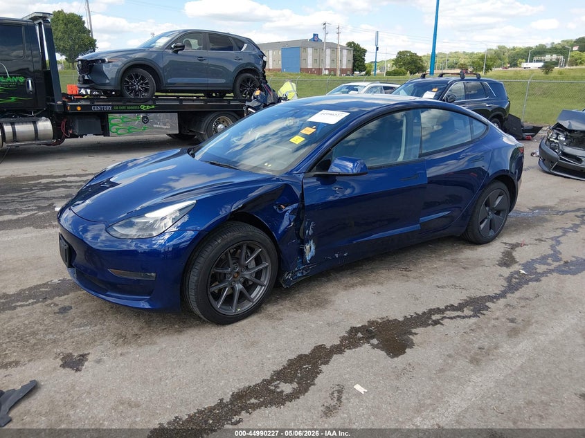 2022 Tesla Model 3 VIN 5YJ3E1EB2NF208047 IAAI salvage auction — SIDE, Salvage (Missouri), sold $9,450 on 2026-07-14 (photo 2)