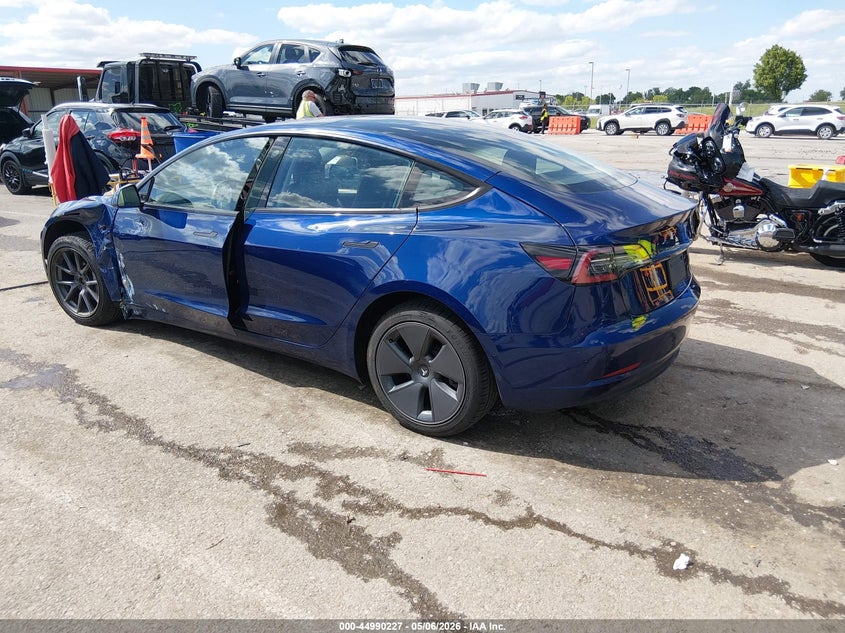2022 Tesla Model 3 VIN 5YJ3E1EB2NF208047 IAAI salvage auction — SIDE, Salvage (Missouri), sold $9,450 on 2026-07-14 (photo 3)