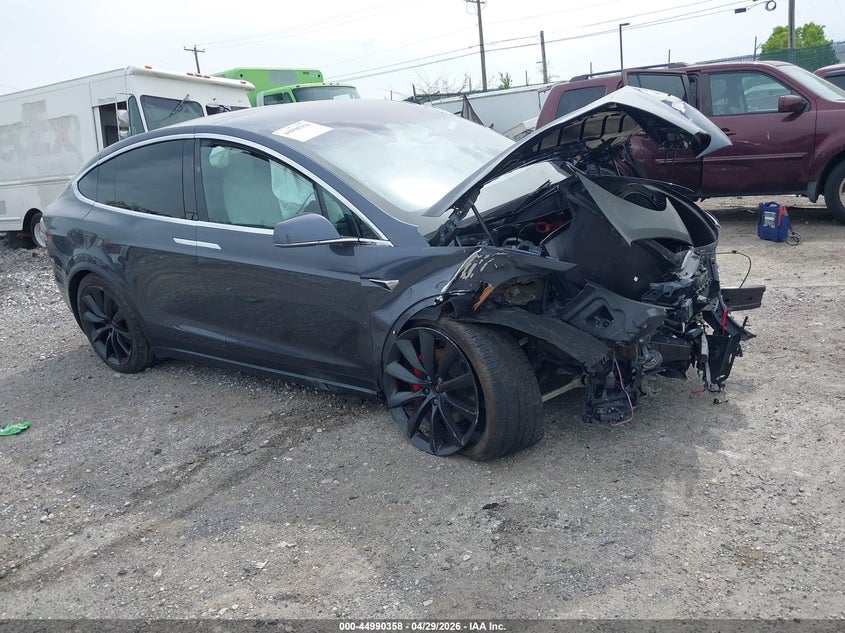 2020 Tesla Model x VIN 5YJXCAE49LF305123 — IAAI salvage auction photo