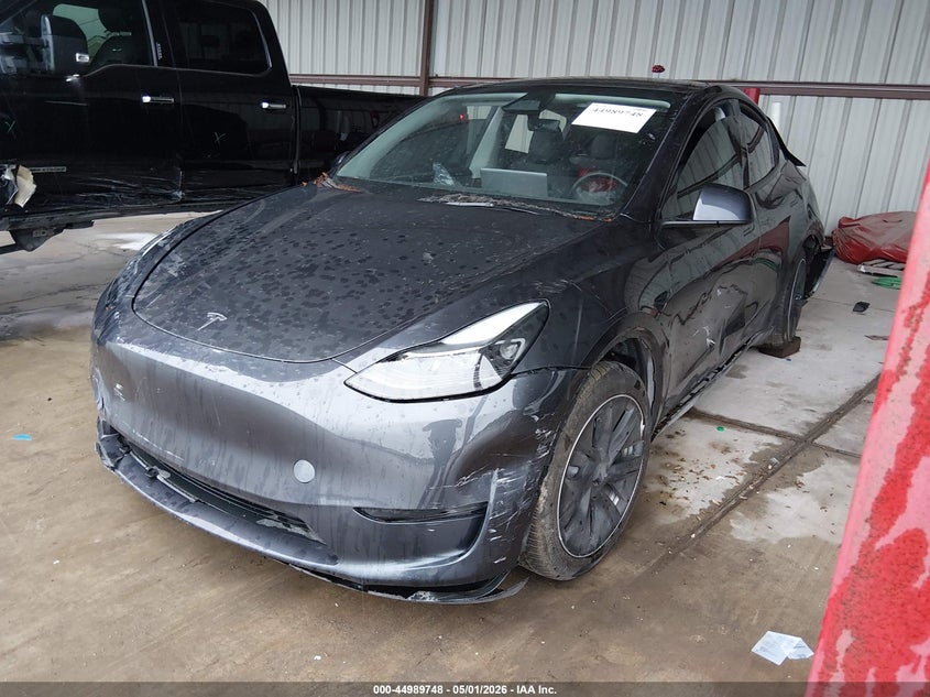 2024 Tesla Model y VIN 7SAYGDED5RF041775 IAAI salvage auction — FRONT & REAR, Salvage (Texas), sold $6,000 on 2026-07-28 (photo 2)