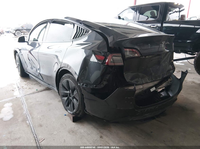 2024 Tesla Model y VIN 7SAYGDED5RF041775 IAAI salvage auction — FRONT & REAR, Salvage (Texas), sold $6,000 on 2026-07-28 (photo 3)