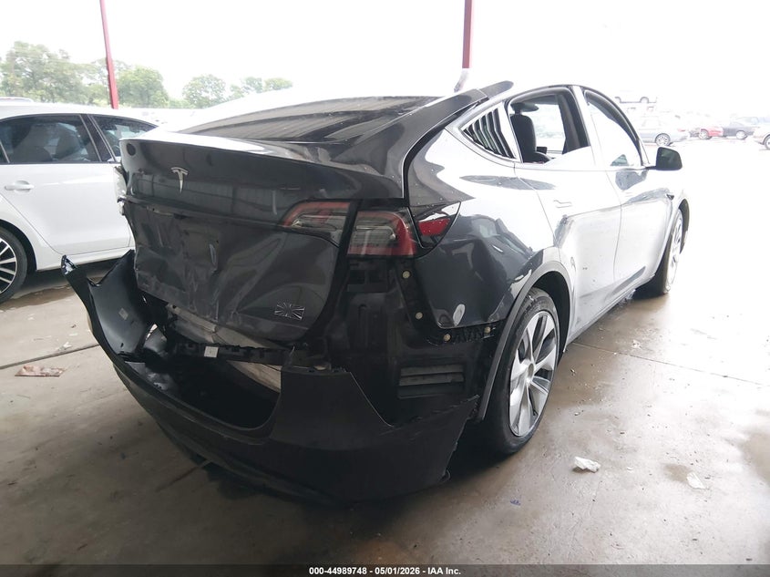 2024 Tesla Model y VIN 7SAYGDED5RF041775 IAAI salvage auction — FRONT & REAR, Salvage (Texas), sold $6,000 on 2026-07-28 (photo 4)