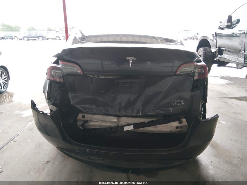 2024 Tesla Model y VIN 7SAYGDED5RF041775 IAAI salvage auction — FRONT & REAR, Salvage (Texas), sold $6,000 on 2026-07-28 (photo 6)