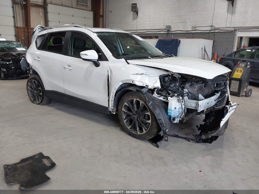 2016 Mazda Cx-5 VIN JM3KE4DY8G0750670 IAAI salvage auction — FRONT & REAR, Mv-907A (New York), sold $925 on 2026-07-29 (photo 1)