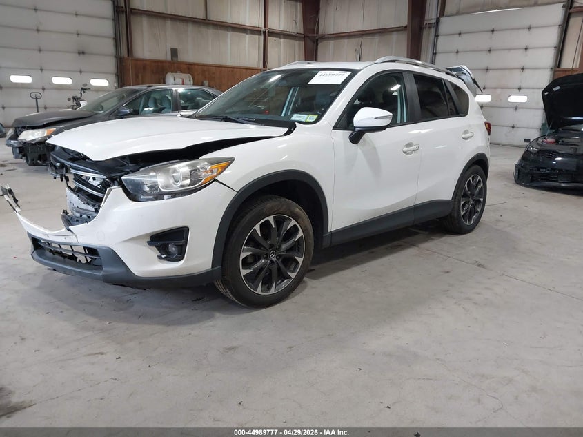2016 Mazda Cx-5 VIN JM3KE4DY8G0750670 IAAI salvage auction — FRONT & REAR, Mv-907A (New York), sold $925 on 2026-07-29 (photo 2)