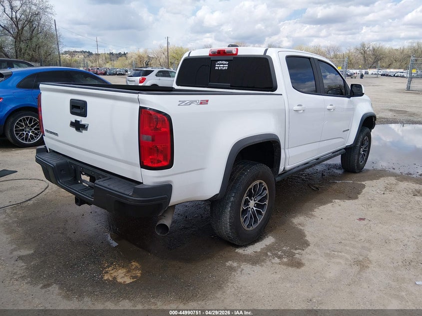 2018 Chevrolet Colorado VIN 1GCPTEE16J1110082 IAAI salvage auction — SIDE, Salvage (Montana), sold $4,550 on 2026-07-10 (photo 4)