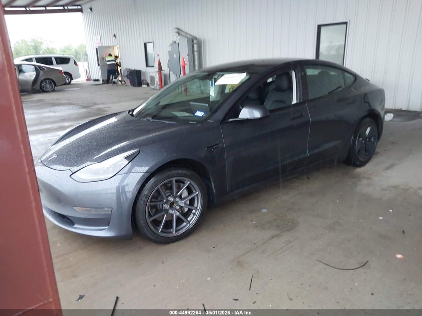 2021 Tesla Model 3 VIN 5YJ3E1EA7MF016497 IAAI salvage auction — RIGHT SIDE, Original (Texas), sold $11,350 on 2026-07-23 (photo 2)